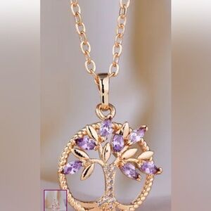 New Gold and Purple Tree Pendant Necklace. The chain is 9in long